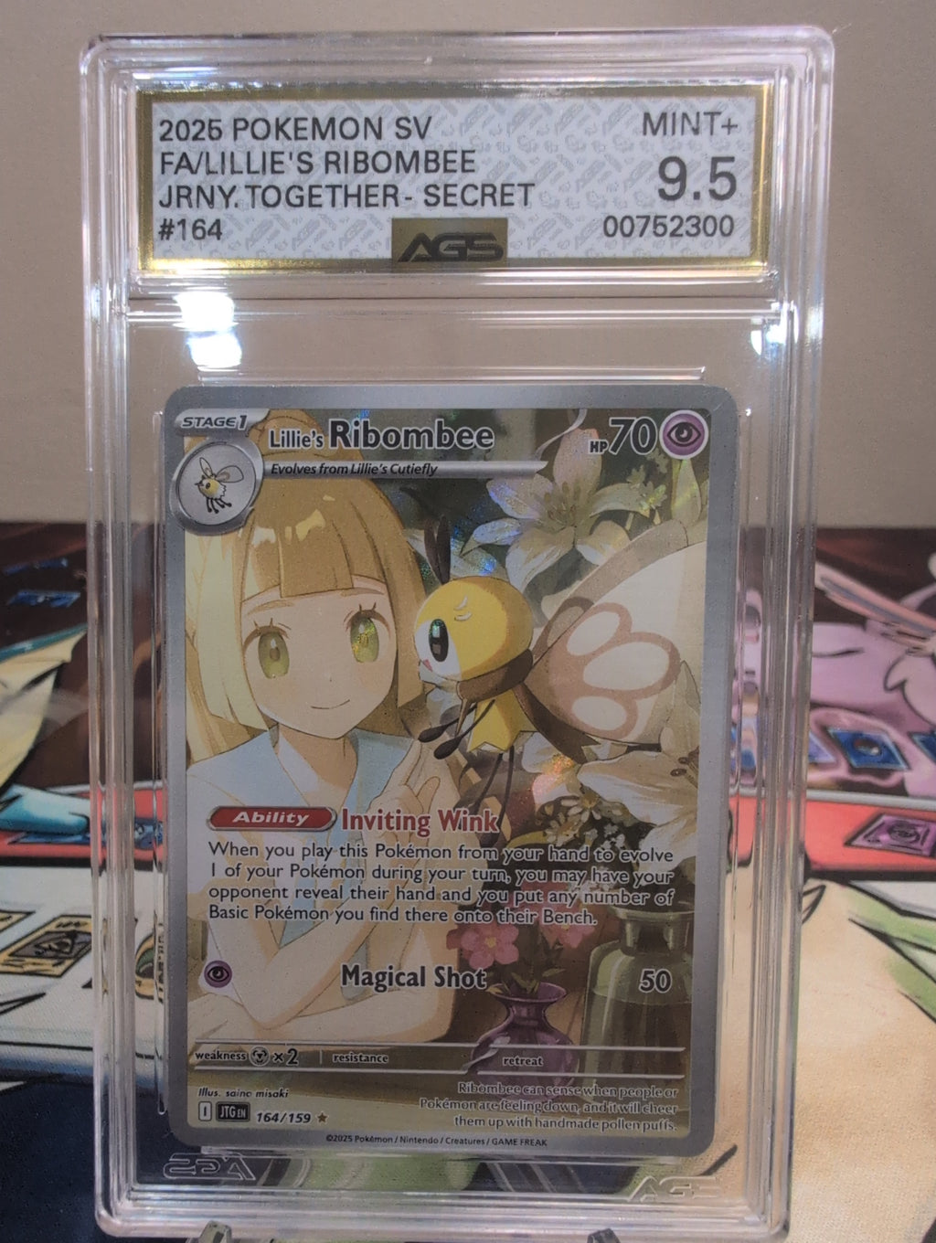 Lillie's Ribombee 164/159 Sv09: Journey Together AGS MINT+ 9.5