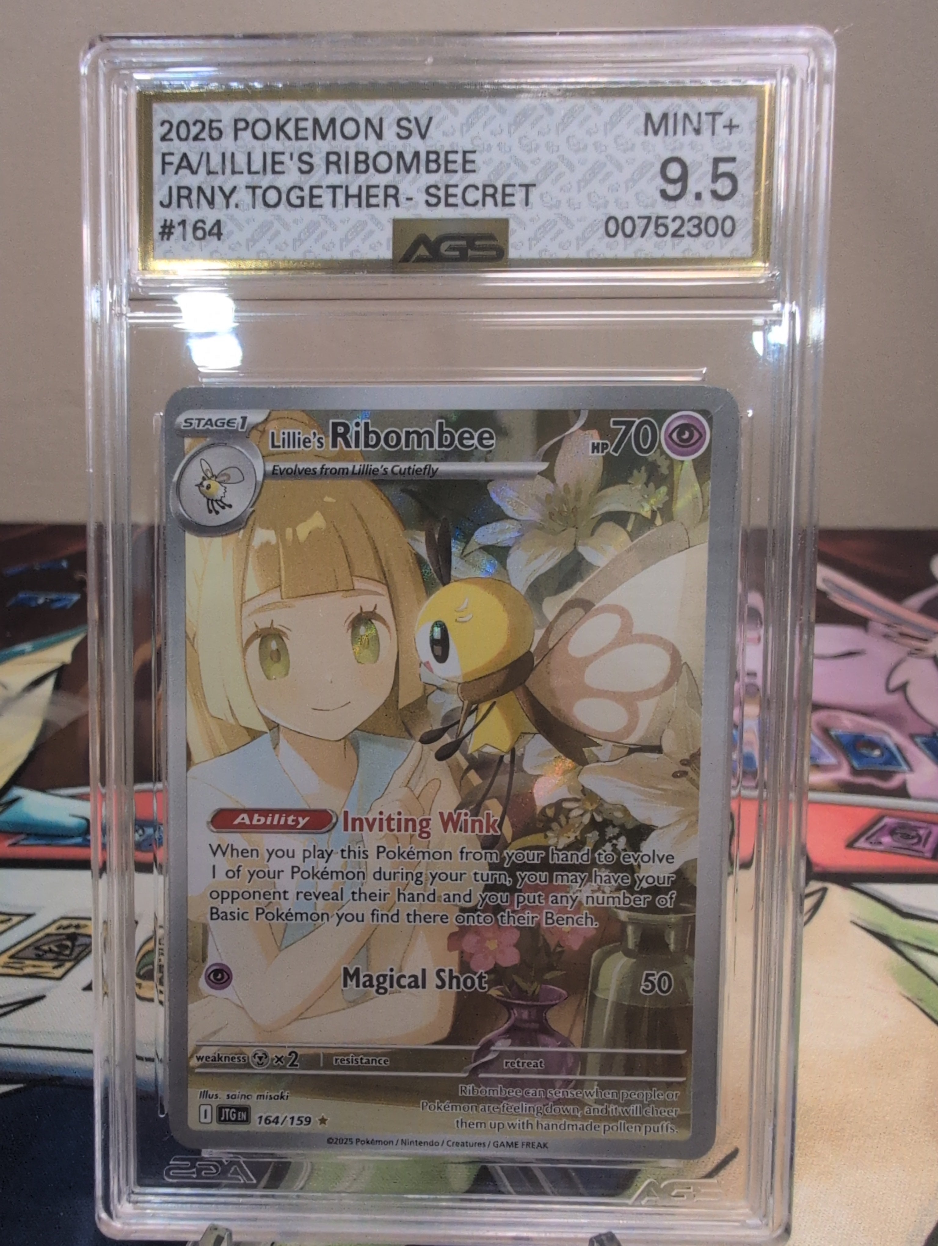 Lillie's Ribombee 164/159 Sv09: Journey Together AGS MINT+ 9.5